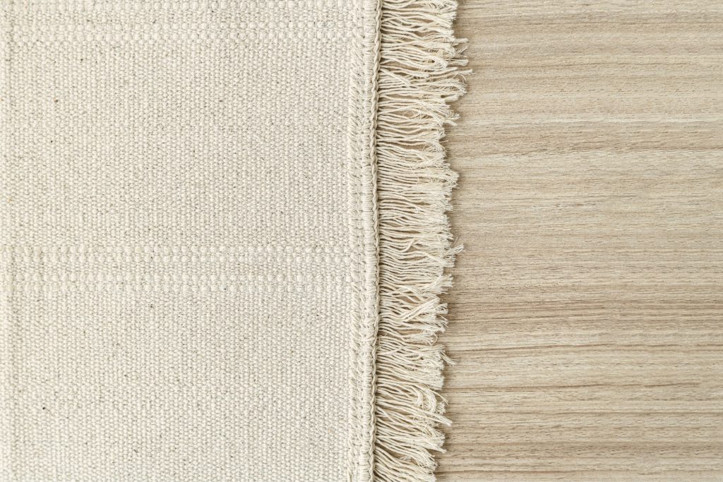 White woven carpet background on the floor